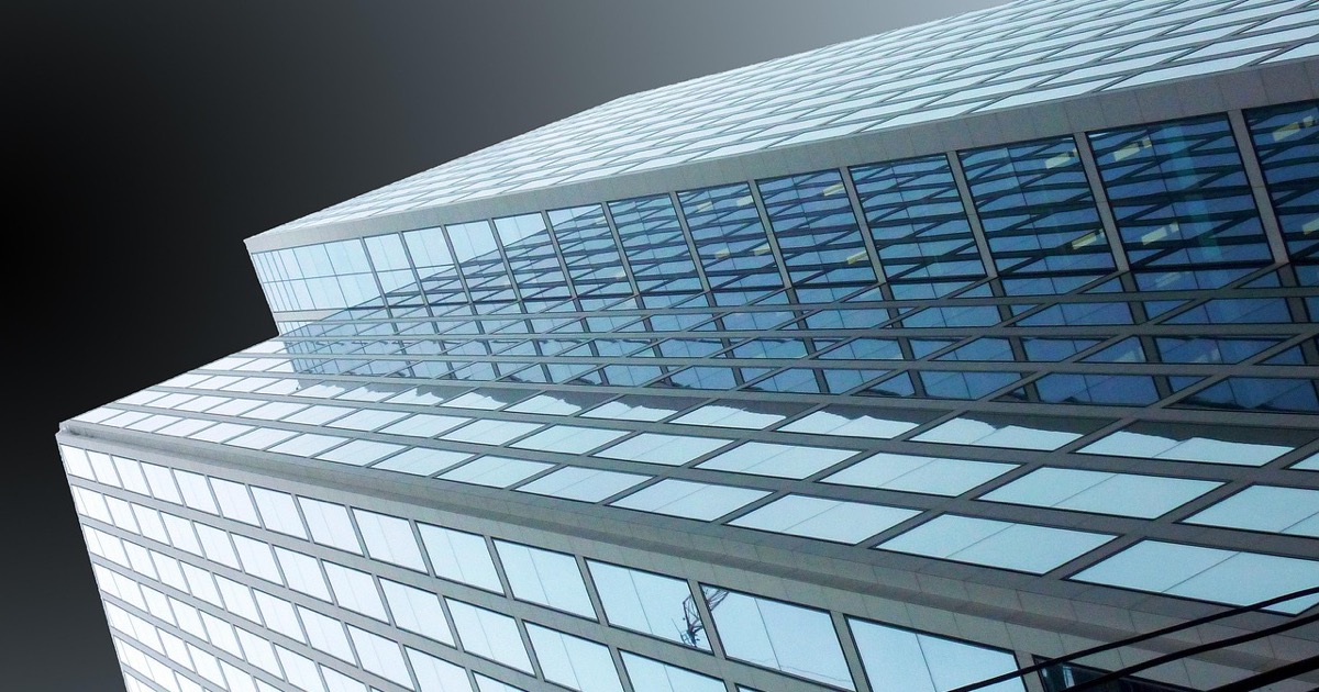 Accès aux missions des grands comptes Immeuble de bureaux représentant l'environnement des grands comptes